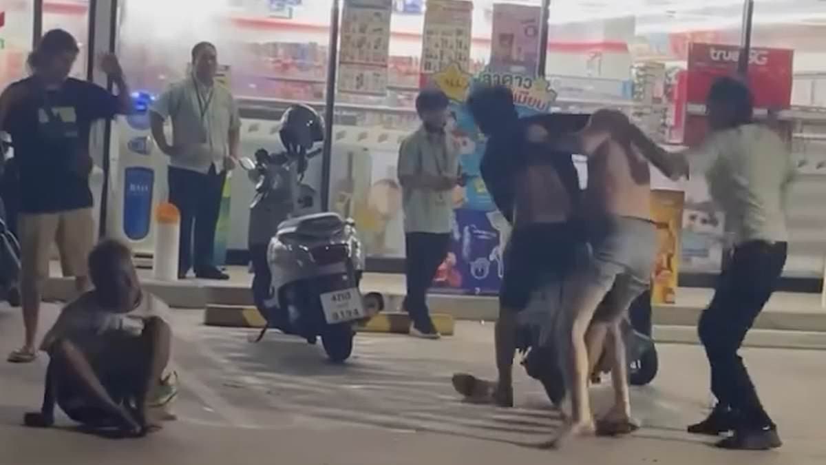 British tourist is attacked by locals after he's accused of trying to steal a drink from Thai supermarket